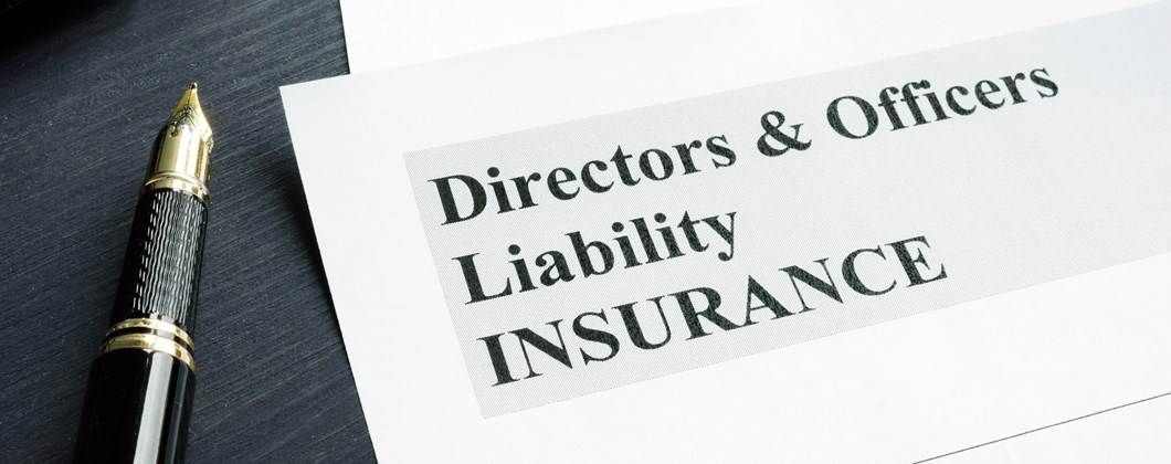 Pen and paper showing Directors & Officers Liability Insurance 